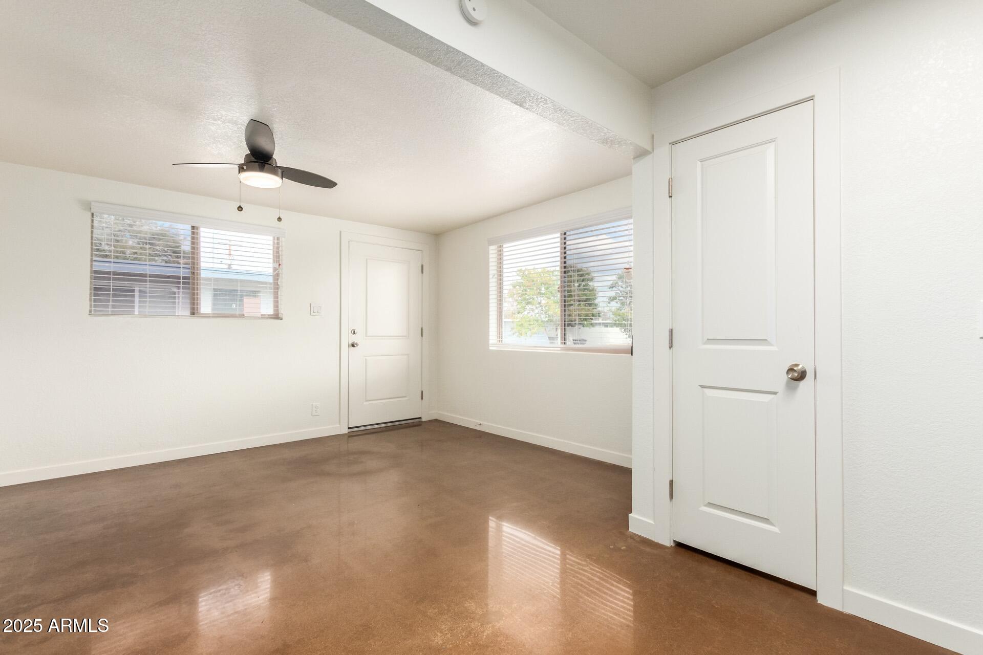 616 South Bellview, Unit C Mesa, AZ 85204 - Photo 9 of 19 a view of an empty room with a window
