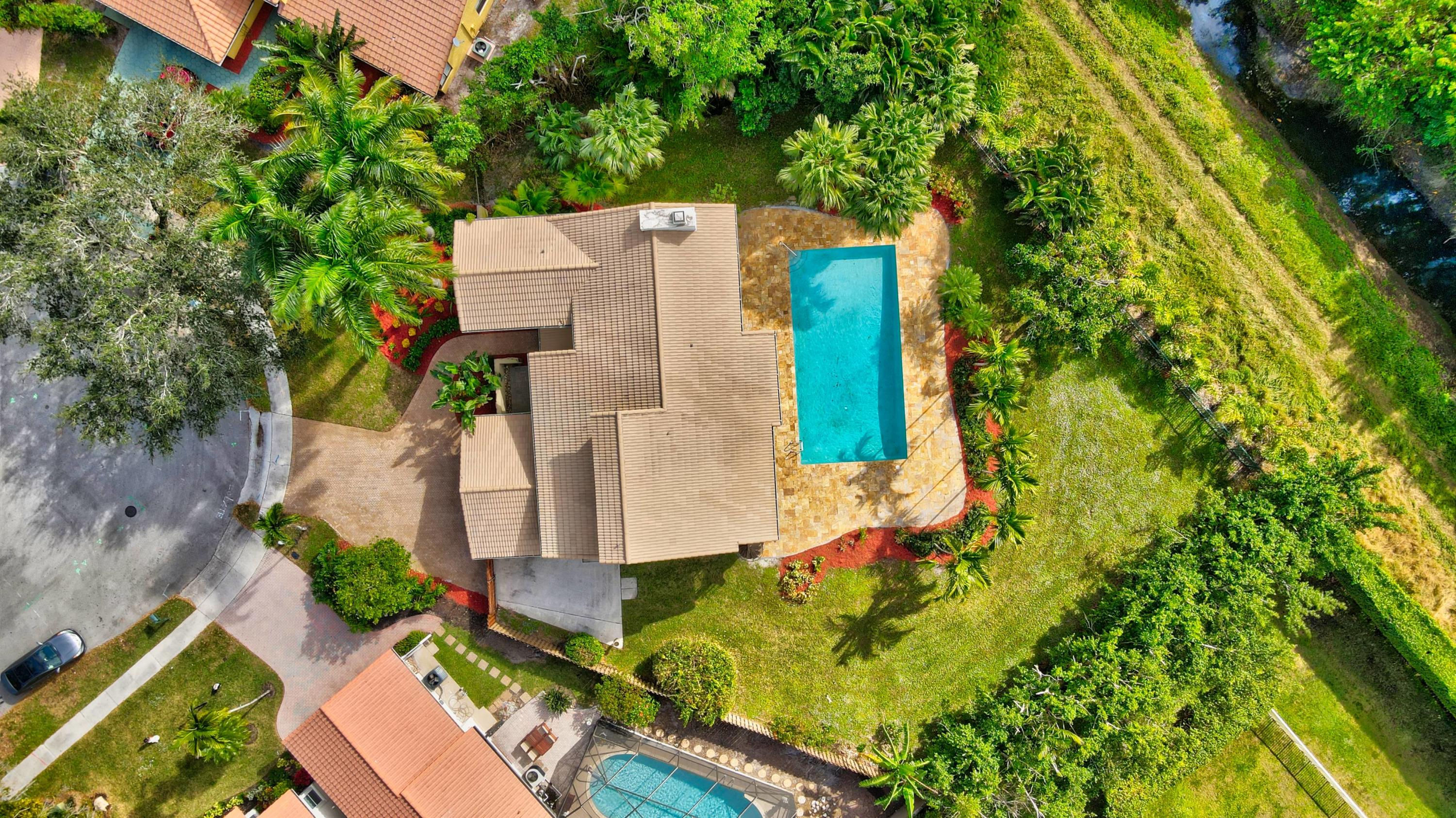 4111 Northwest 28th Way Boca Raton, FL 33434 - Photo 3 of 83 81_dji_0257and4more