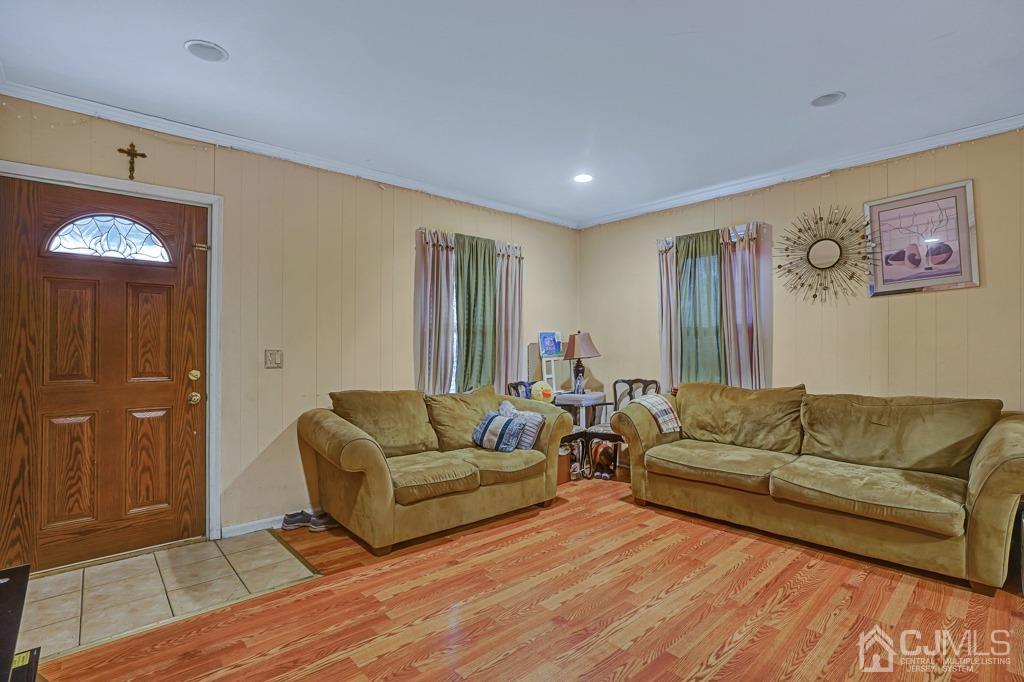 708 Front Street Dunellen, NJ 08812 - Photo 3 of 19 As you enter into the home - Living Room