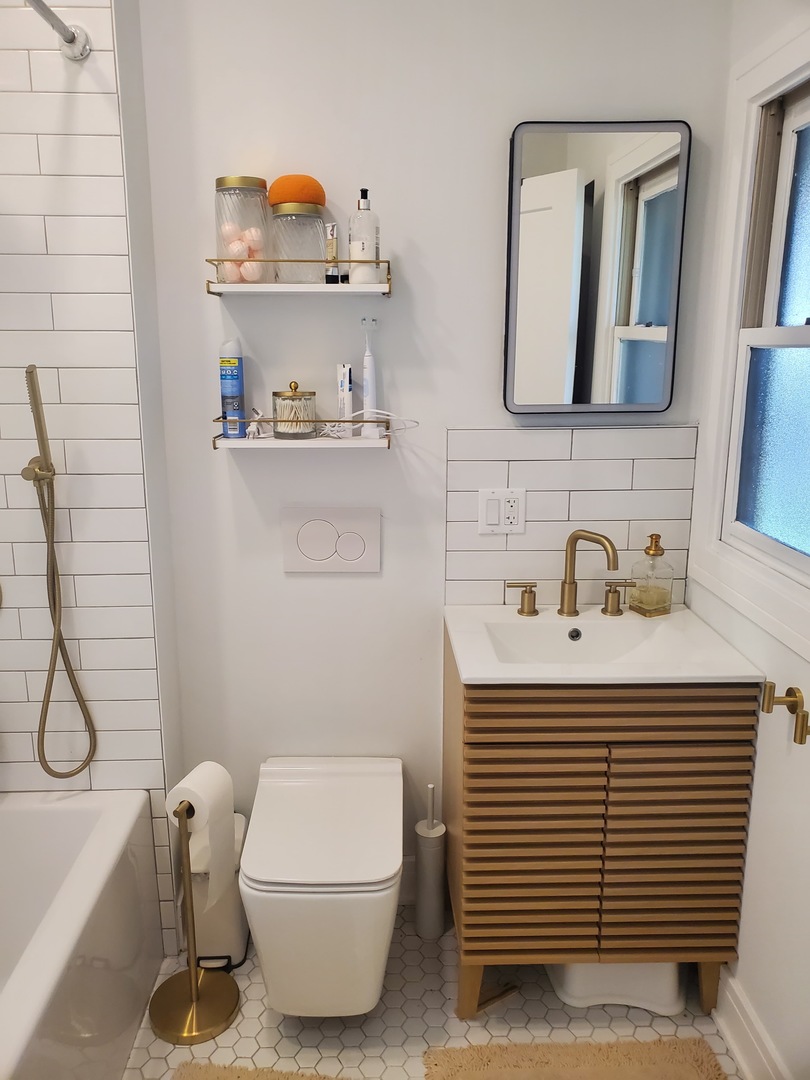 4-a94 Springfield Drive Apple River, IL 61001 - Photo 28 of 35 a bathroom with a sink and a mirror