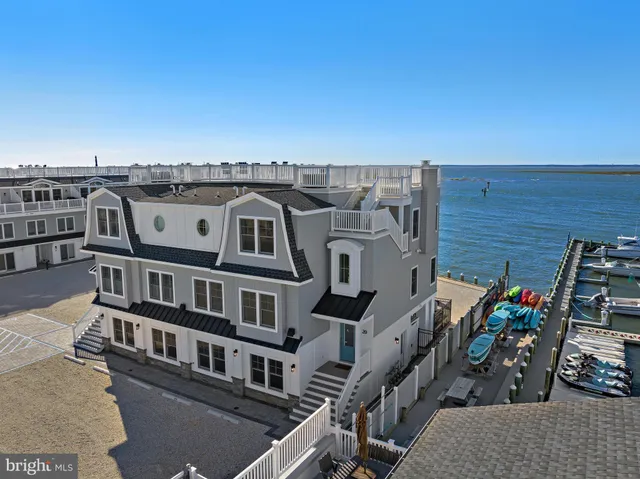 an aerial view of a house with a garage