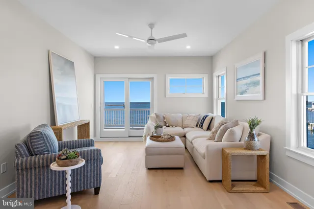 a bedroom with a bed and a lamp