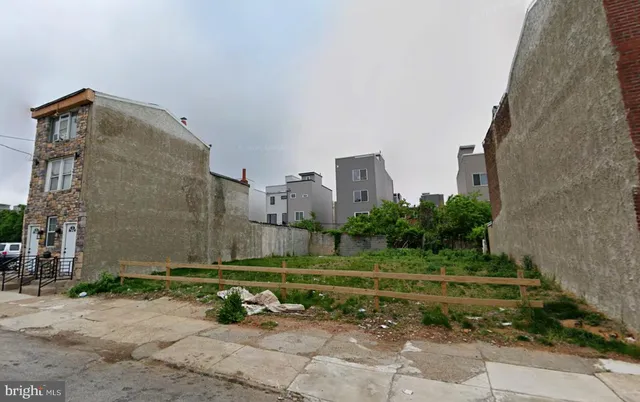 a view of a stadium that has a big yard