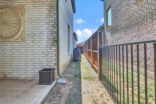 a view of a pathway both side of building