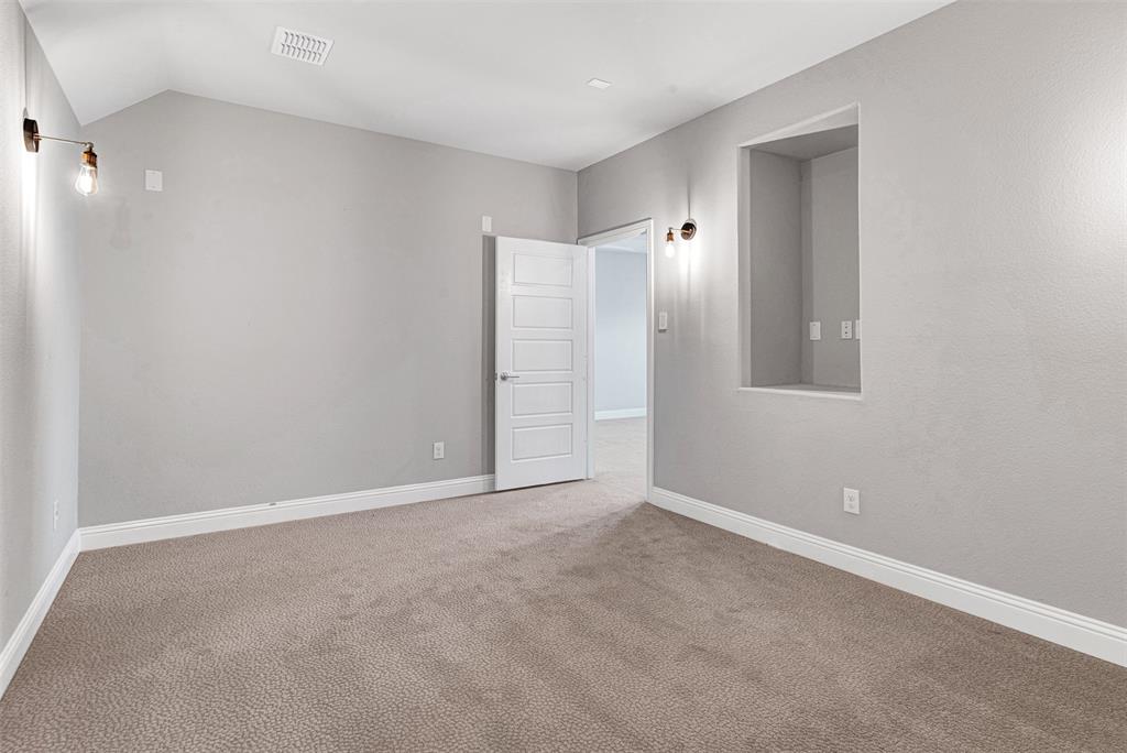 468 Caitlyn Way Fairview, TX 75069 - Photo 30 of 35 Spare room featuring baseboards and light colored carpet