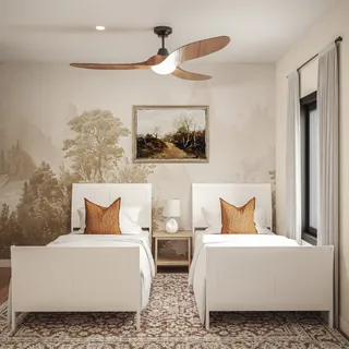 a bedroom with a bed and a painting on the wall