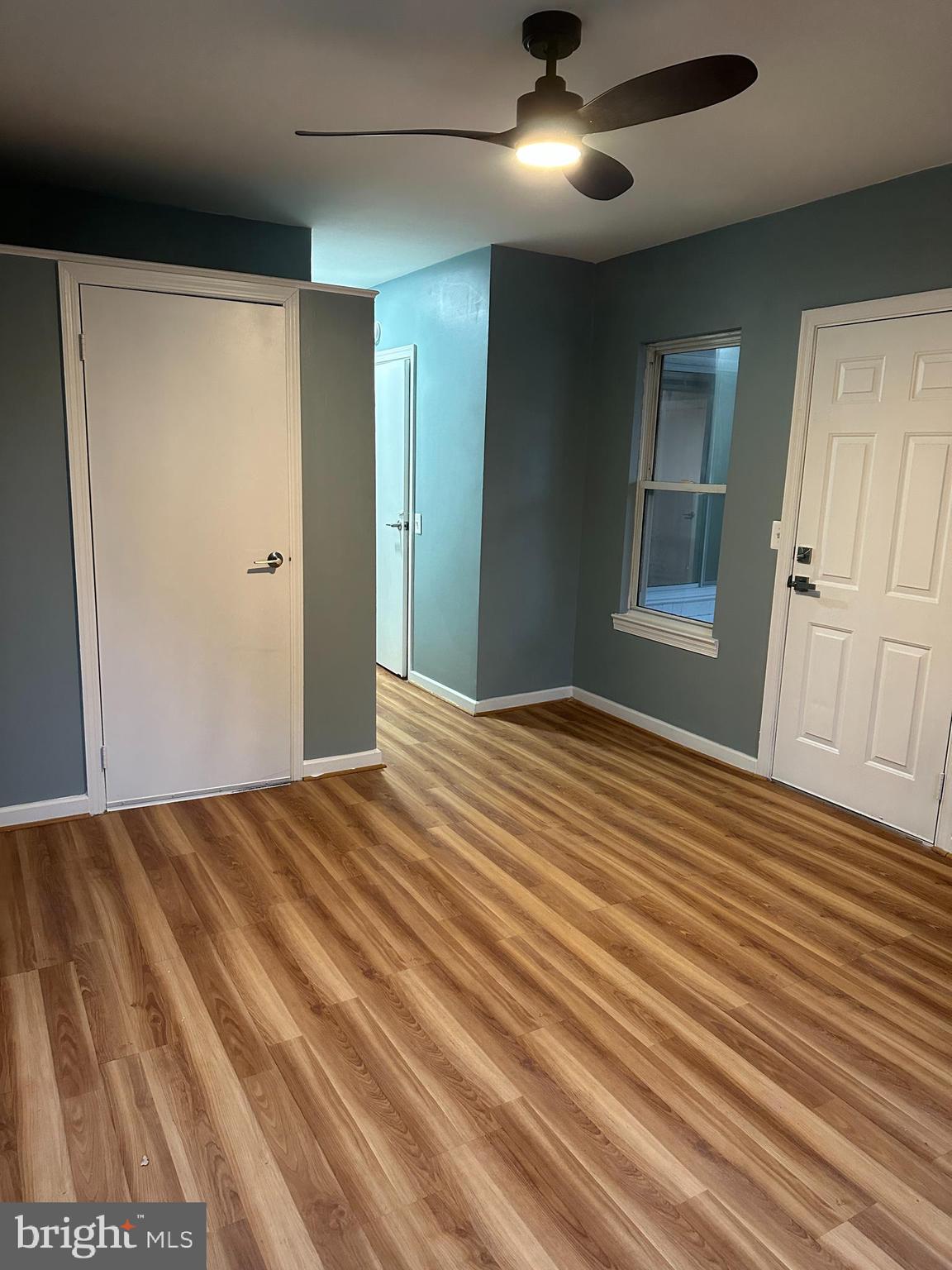 8411 11th Avenue Silver Spring, MD 20903 - Photo 14 of 24 a bedroom with a bed and a flat tv screen