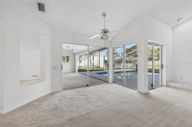 a view of a livingroom with a furniture and chandelier