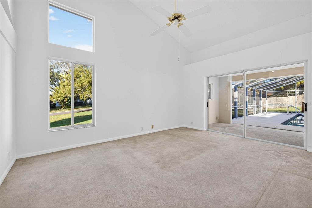 1819 Tree Swallow Way Palm Harbor, FL 34683 - Photo 17 of 37 a view of an empty room with a window