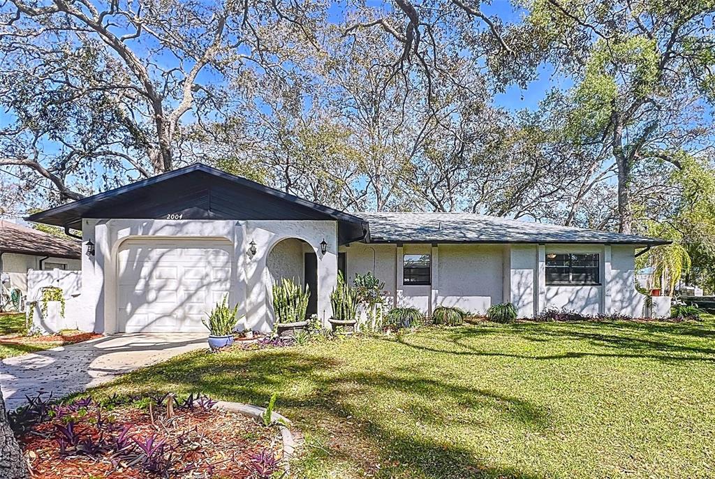 a front view of house with yard