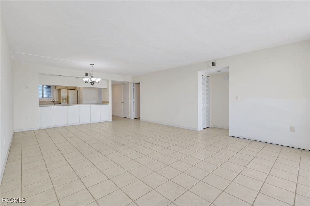 15010 Punta Rassa Road, Unit 305 Fort Myers, FL 33908 - Photo 5 of 21 a view of a livingroom and a bathroom