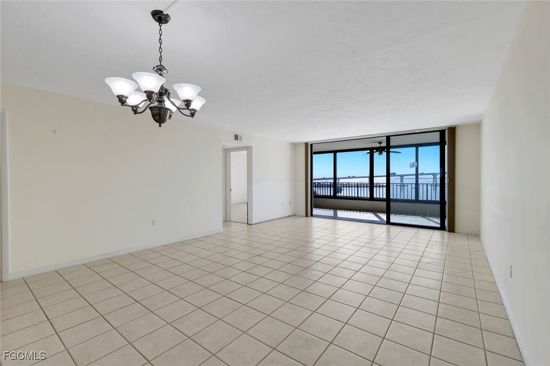 15010 Punta Rassa Road, Unit 305 Fort Myers, FL 33908 - Photo 7 of 21 a view of an empty room with a window