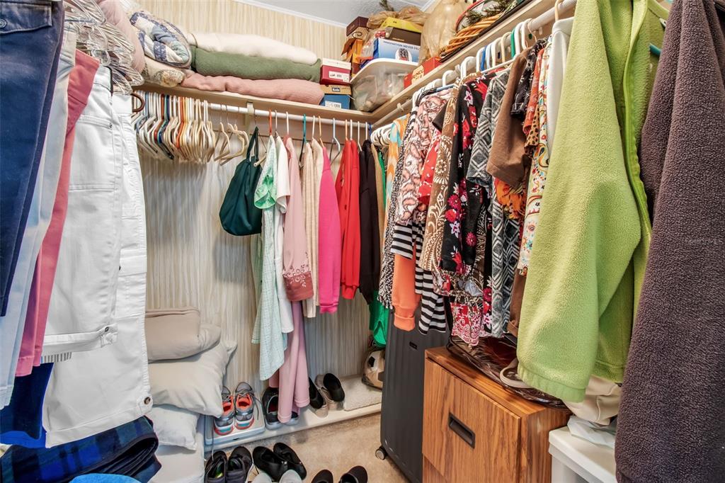 5619 Bayshore Road, Unit 160 Palmetto, FL 34221 - Photo 17 of 30 a view of walk in closet with clothes