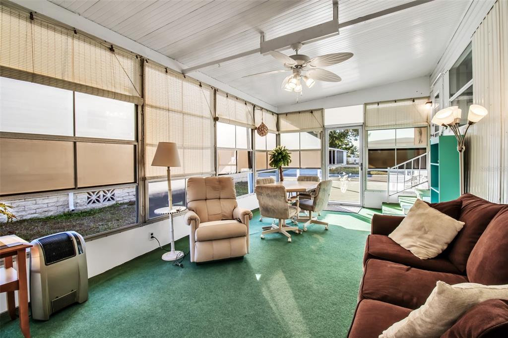 5619 Bayshore Road, Unit 160 Palmetto, FL 34221 - Photo 22 of 30 a living room with furniture and a large window