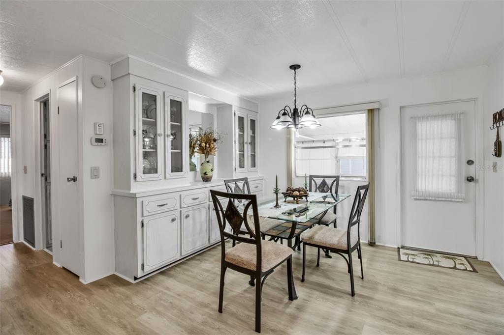 5619 Bayshore Road, Unit 160 Palmetto, FL 34221 - Photo 4 of 30 a view of a dining room with furniture and window