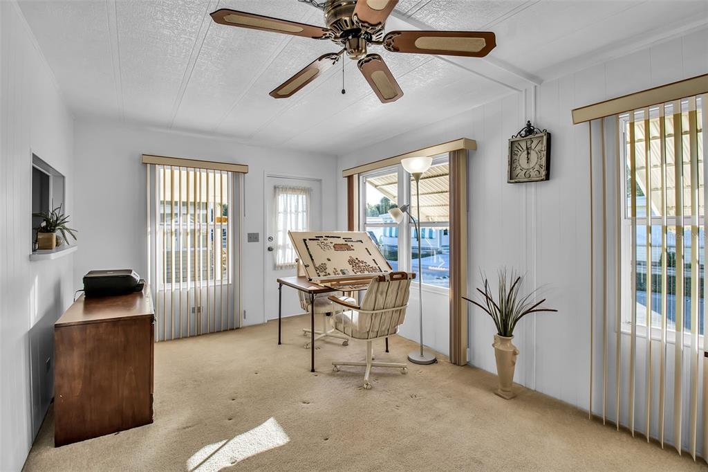 5619 Bayshore Road, Unit 160 Palmetto, FL 34221 - Photo 10 of 30 a living room with furniture and a window