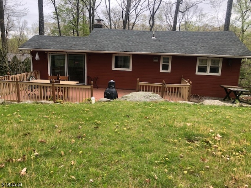 208 Pohatcong Road Vernon, NJ 07422 - Photo 11 of 15 a house view with a sitting space and garden