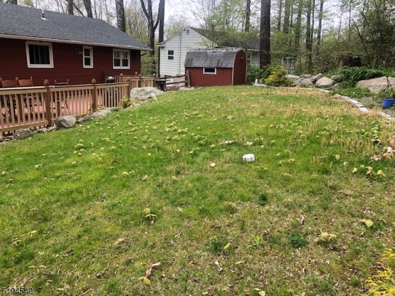 208 Pohatcong Road Vernon, NJ 07422 - Photo 13 of 15 a view of a house with a yard and fence
