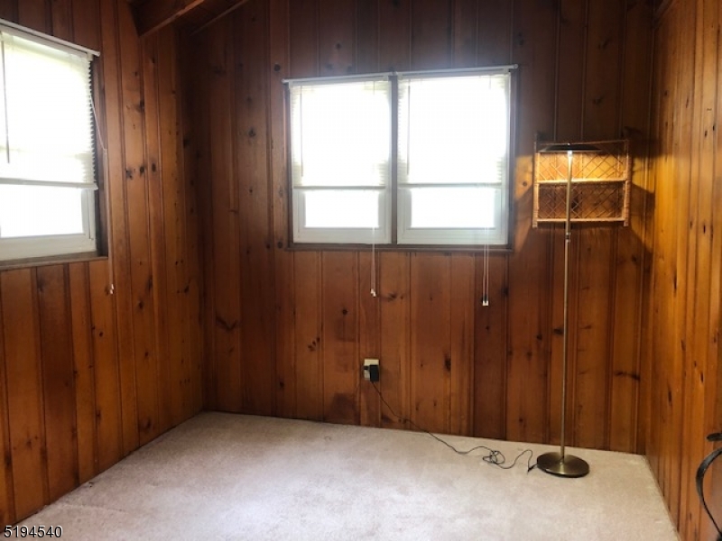 208 Pohatcong Road Vernon, NJ 07422 - Photo 15 of 15 a view of an empty room with a window