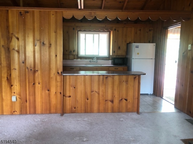 208 Pohatcong Road Vernon, NJ 07422 - Photo 3 of 15 an entryway with a door