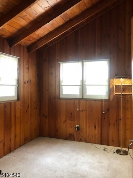 208 Pohatcong Road Vernon, NJ 07422 - Photo 7 of 15 a view of an empty room with a window