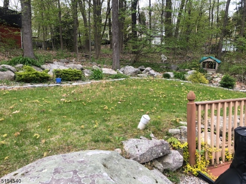 208 Pohatcong Road Vernon, NJ 07422 - Photo 9 of 15 a backyard of a house with lots of green space