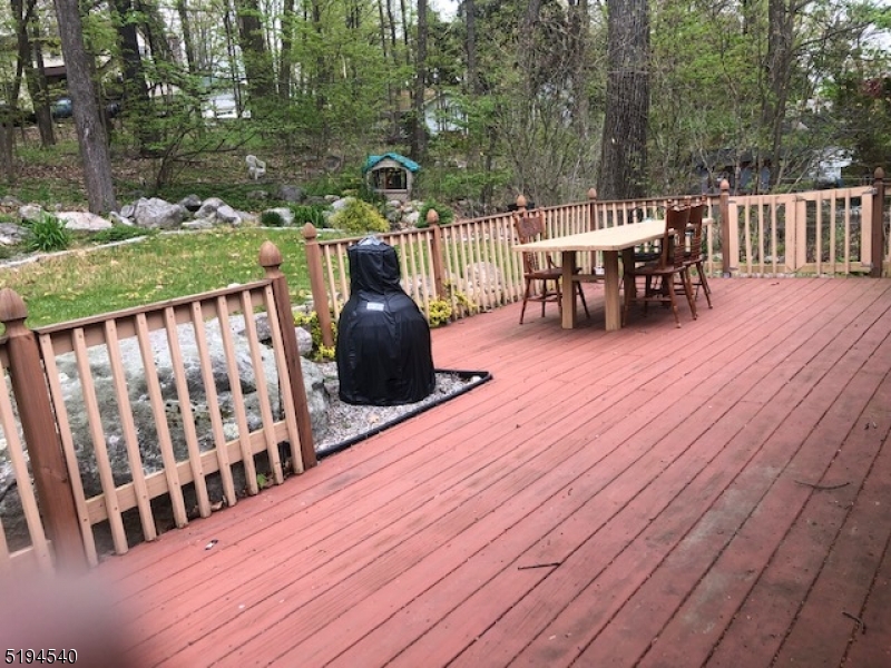 208 Pohatcong Road Vernon, NJ 07422 - Photo 10 of 15 a view of a wooden deck and outdoor space