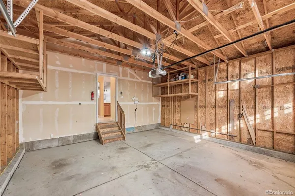 a view of a room with wooden walls