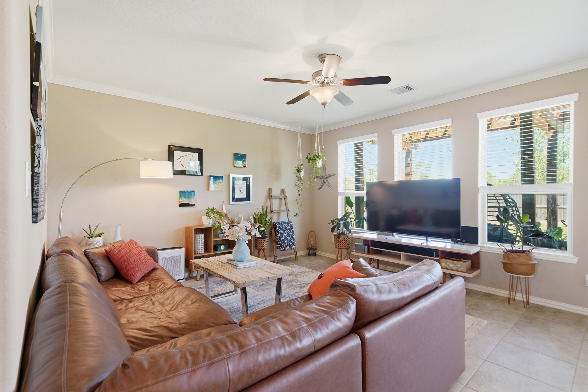 13207 Alcott Forest Lane Rosharon, TX 77583 - Photo 15 of 44 Huge windows ensure the den is light and bright.