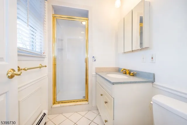 a view of vanity and utility room