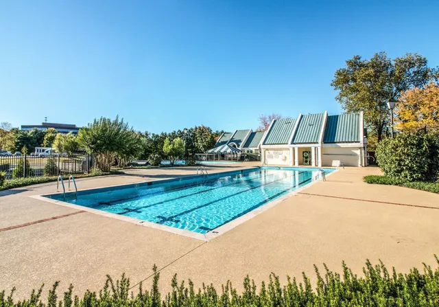 a view of a house with outdoor space and sitting area