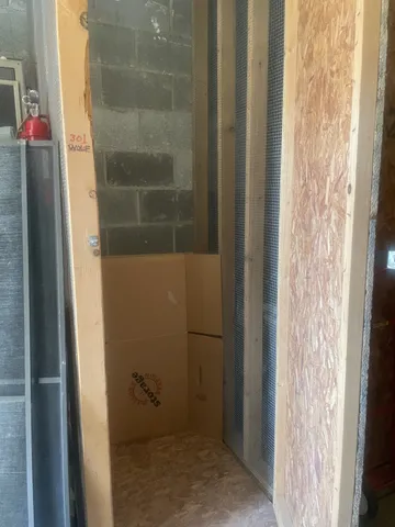 a view of living room with furniture and flat screen tv
