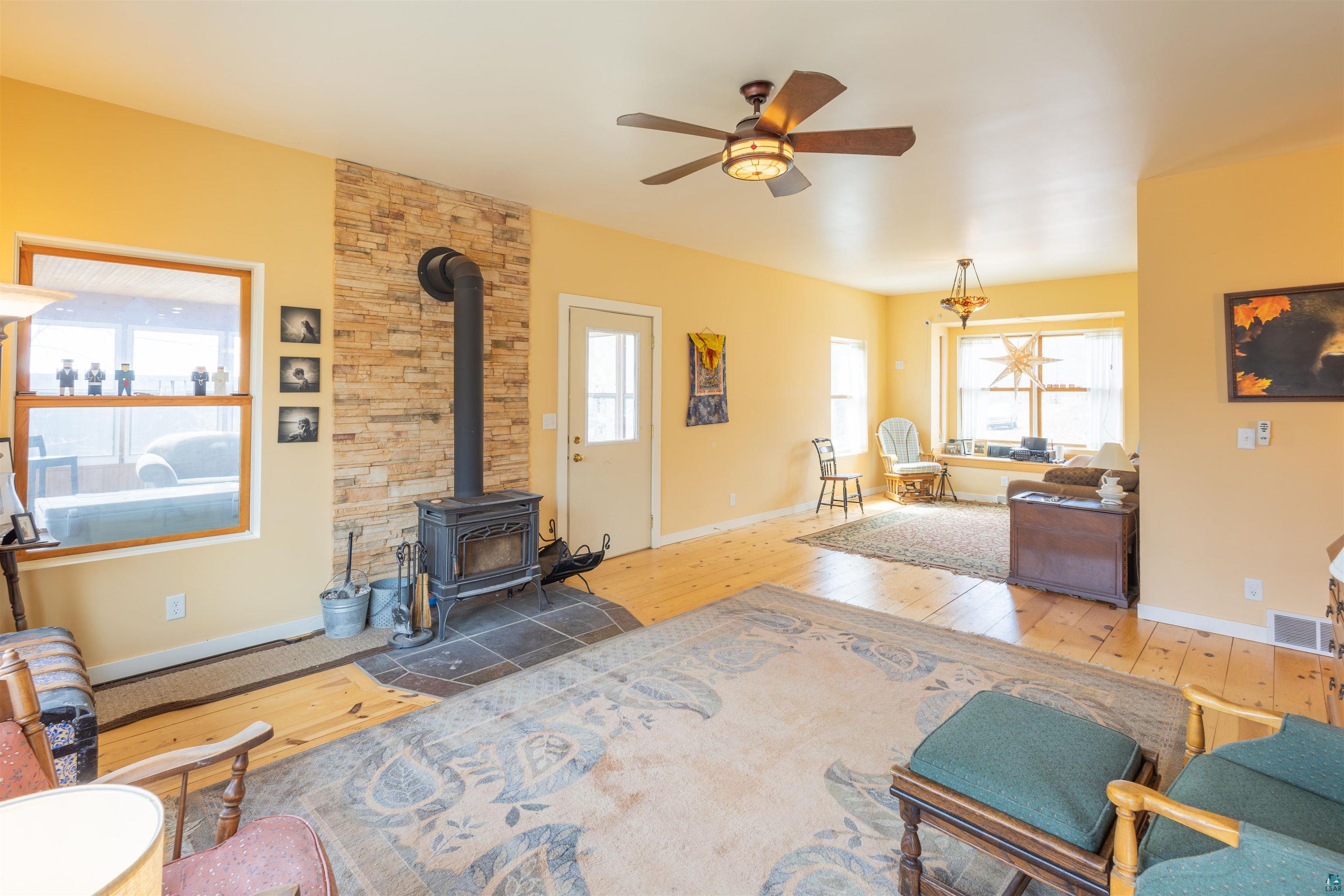 20210 Siskiwit Lake Road Cornucopia, WI 54827 - Photo 12 of 40 Wood fireplace