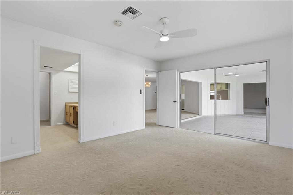 135 Pebble Beach Boulevard Naples, FL 34113 - Photo 17 of 37 a view of empty room