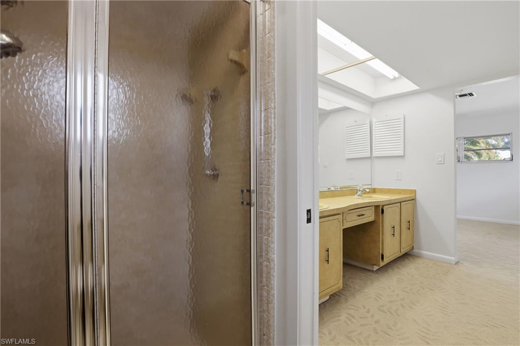135 Pebble Beach Boulevard Naples, FL 34113 - Photo 19 of 37 a view of utility room and washer dryer