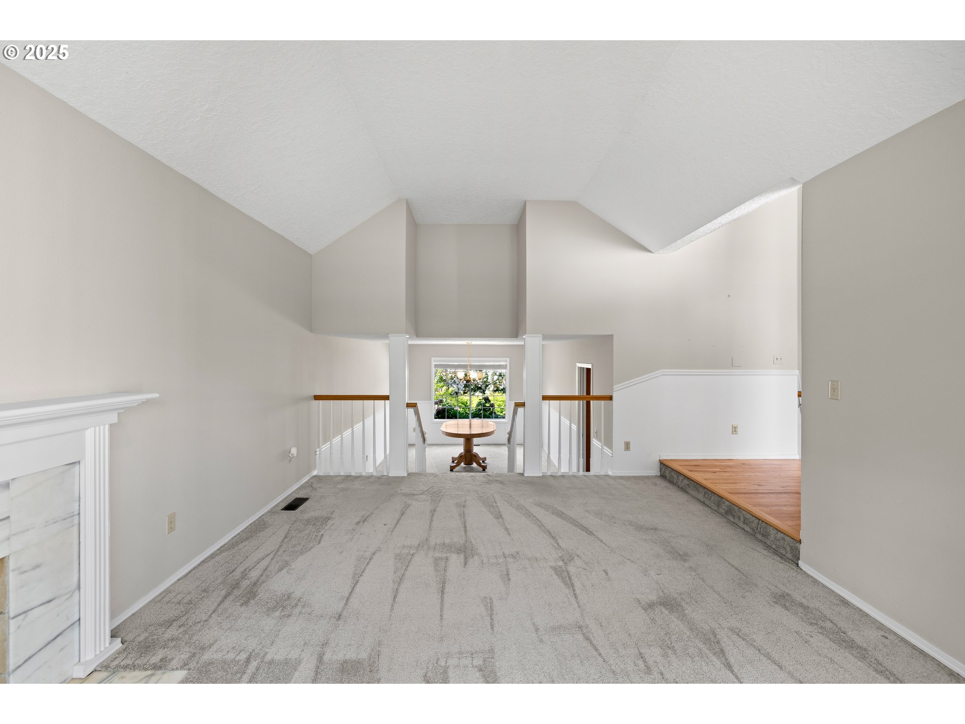5393 Southwest Wichita Street Tualatin, OR 97062 - Photo 11 of 45 a view of empty room with wooden floor