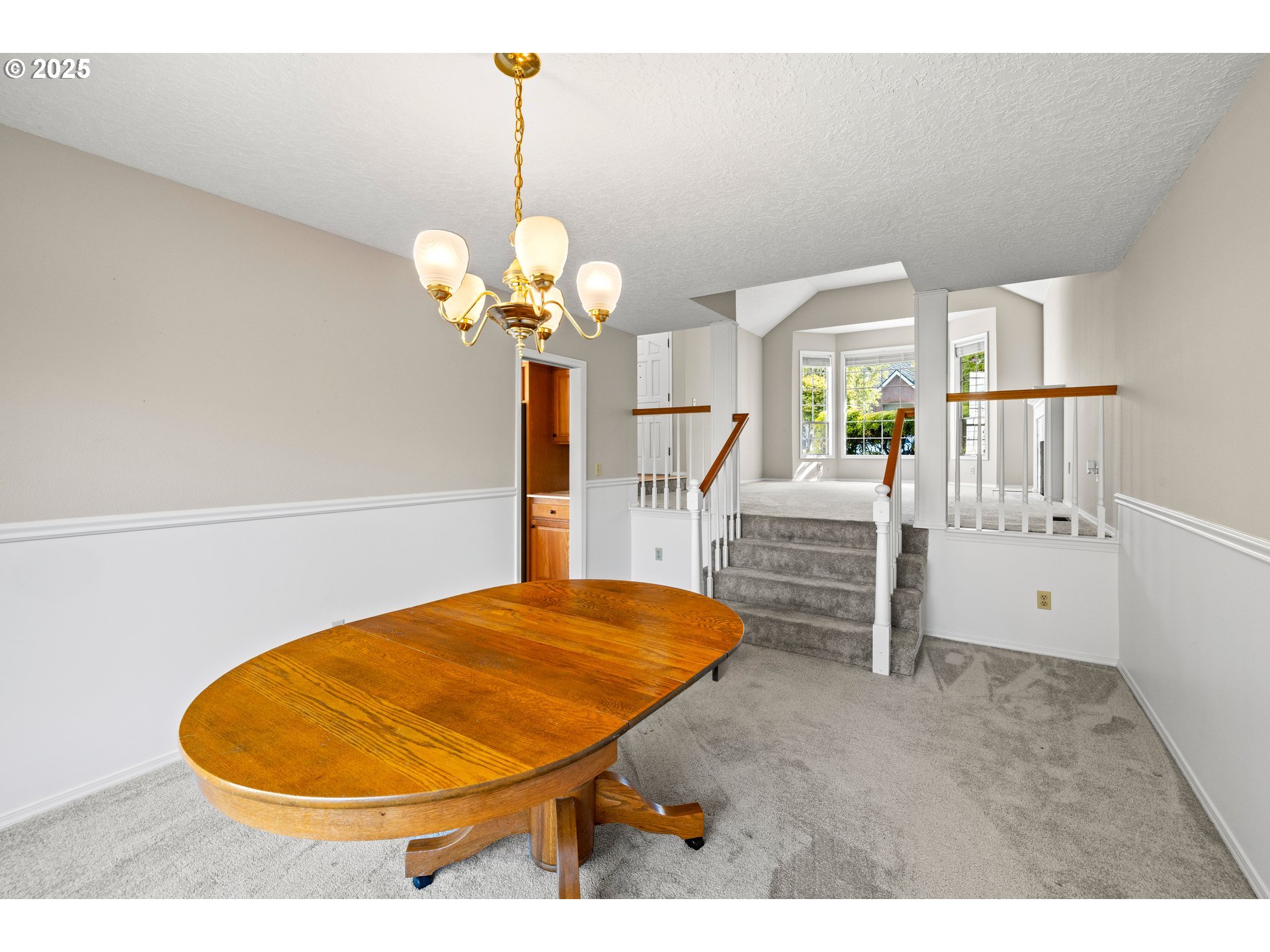5393 Southwest Wichita Street Tualatin, OR 97062 - Photo 13 of 45 a view of a room with a chandelier