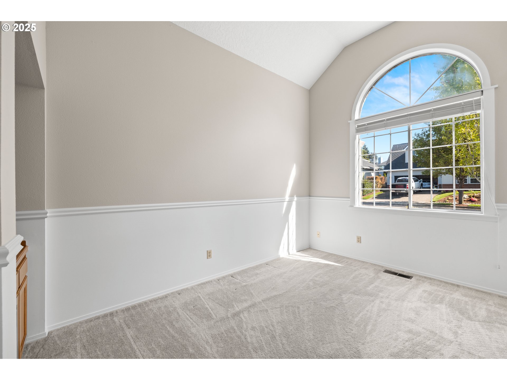 5393 Southwest Wichita Street Tualatin, OR 97062 - Photo 26 of 45 a view of an empty room with a window