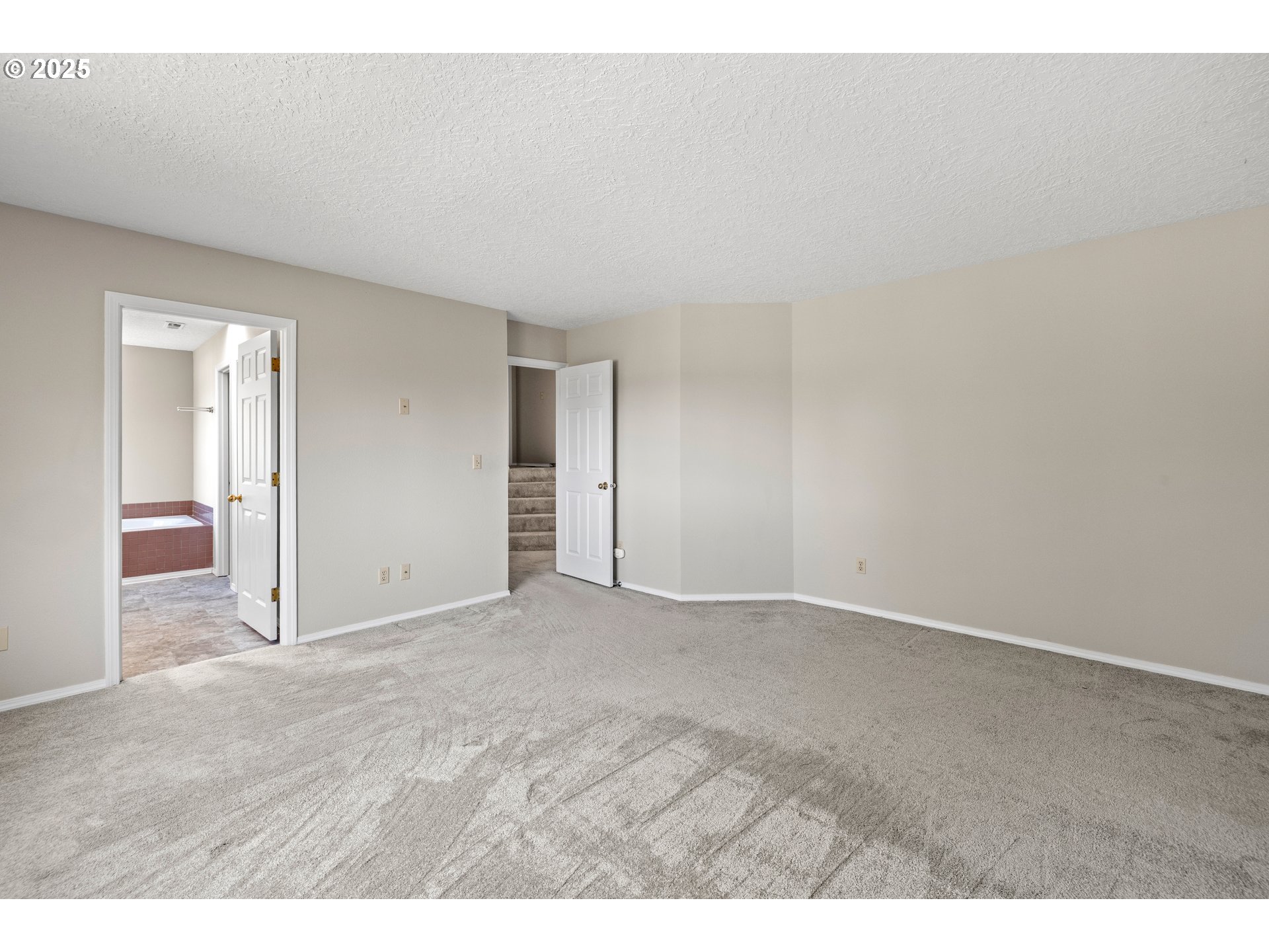 5393 Southwest Wichita Street Tualatin, OR 97062 - Photo 29 of 45 a view of an empty room and wooden floor