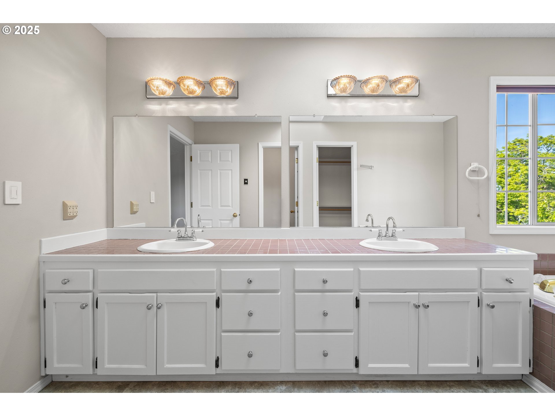 5393 Southwest Wichita Street Tualatin, OR 97062 - Photo 31 of 45 a bathroom with a sink and a mirror