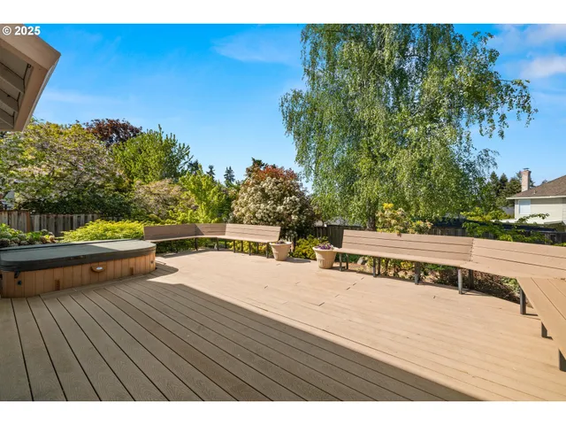 a view of swimming pool with seating space
