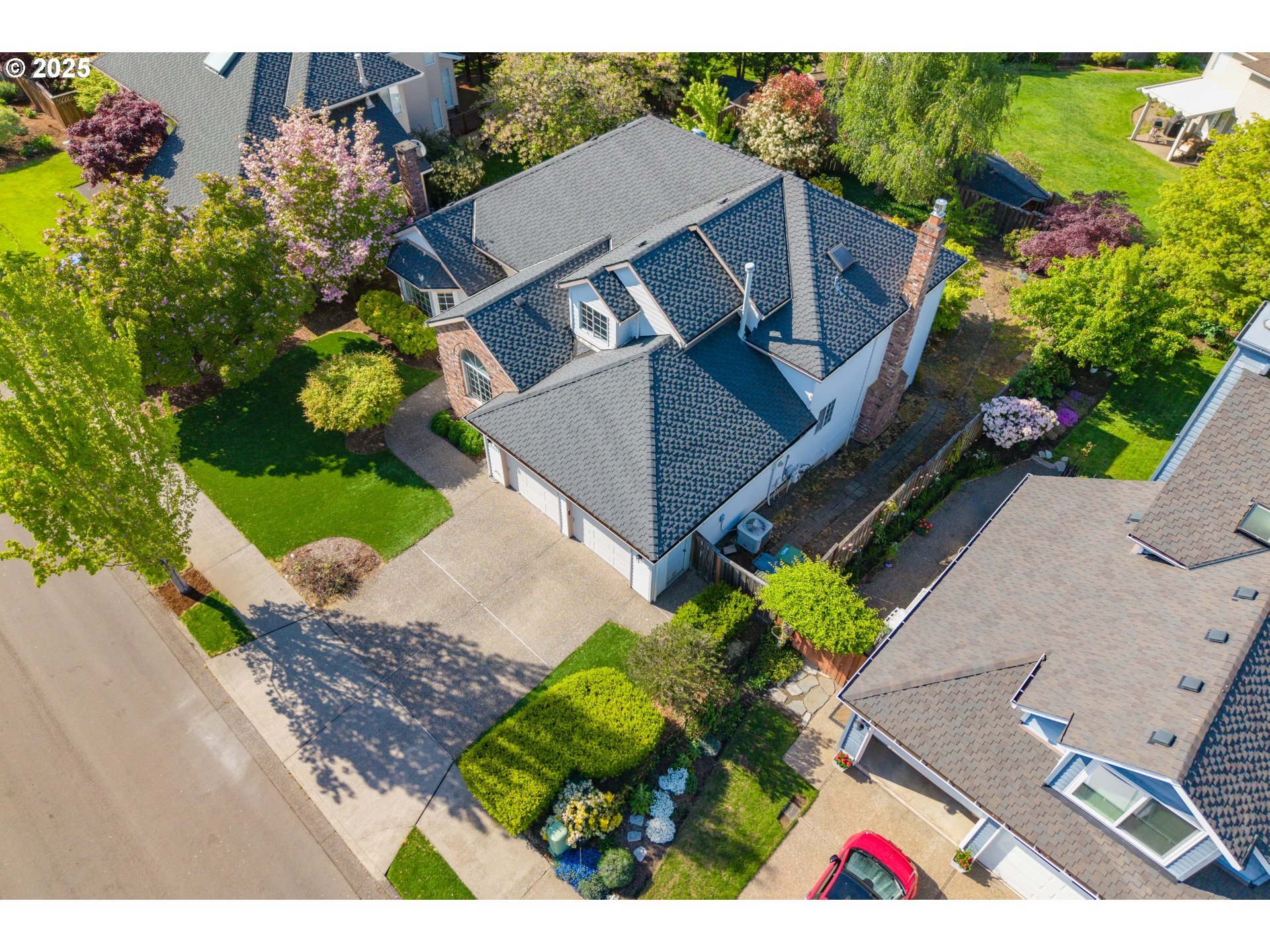 5393 Southwest Wichita Street Tualatin, OR 97062 - Photo 44 of 45 an aerial view of house with yard