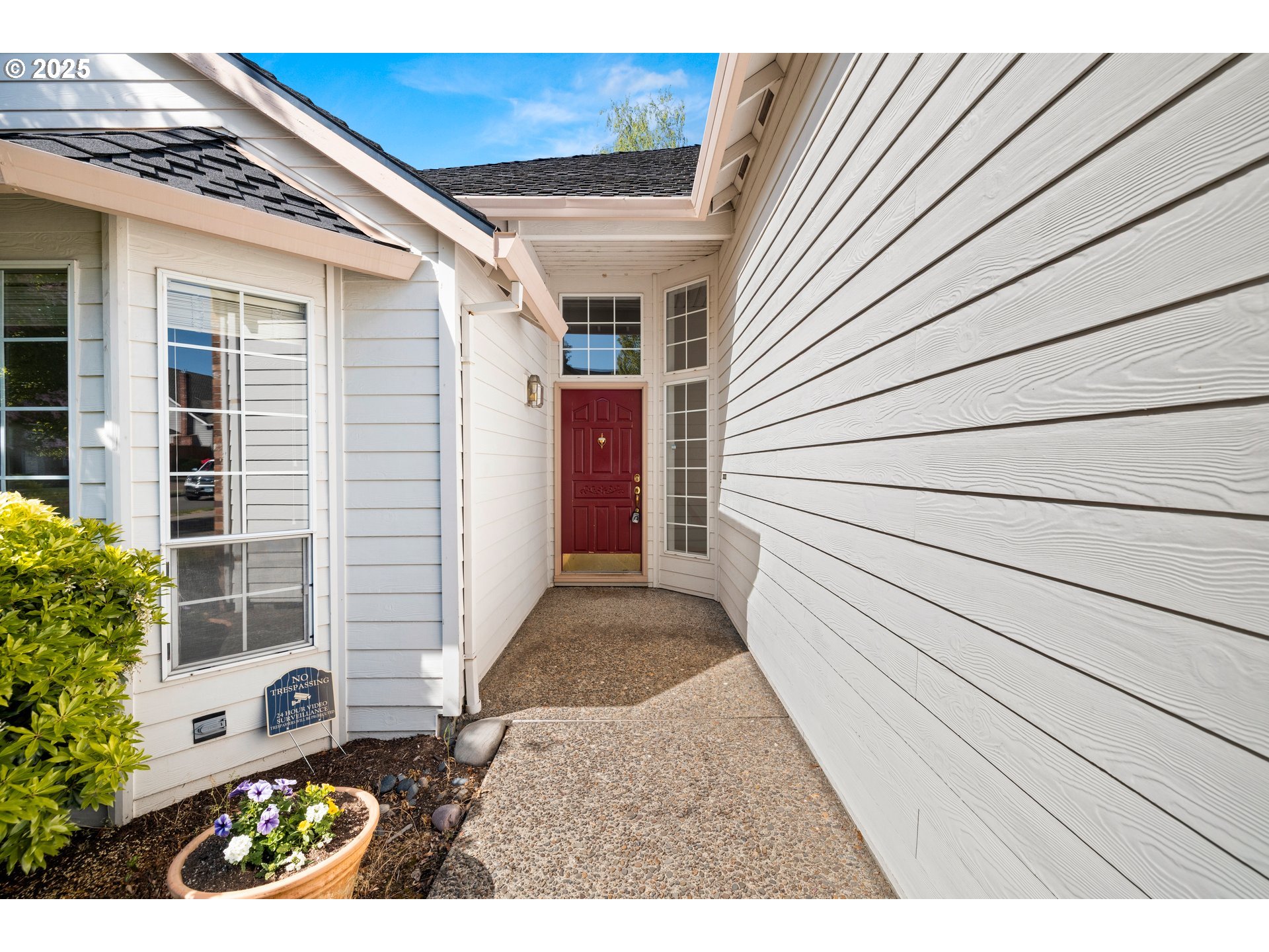 5393 Southwest Wichita Street Tualatin, OR 97062 - Photo 7 of 45 a view of a back yard of the house