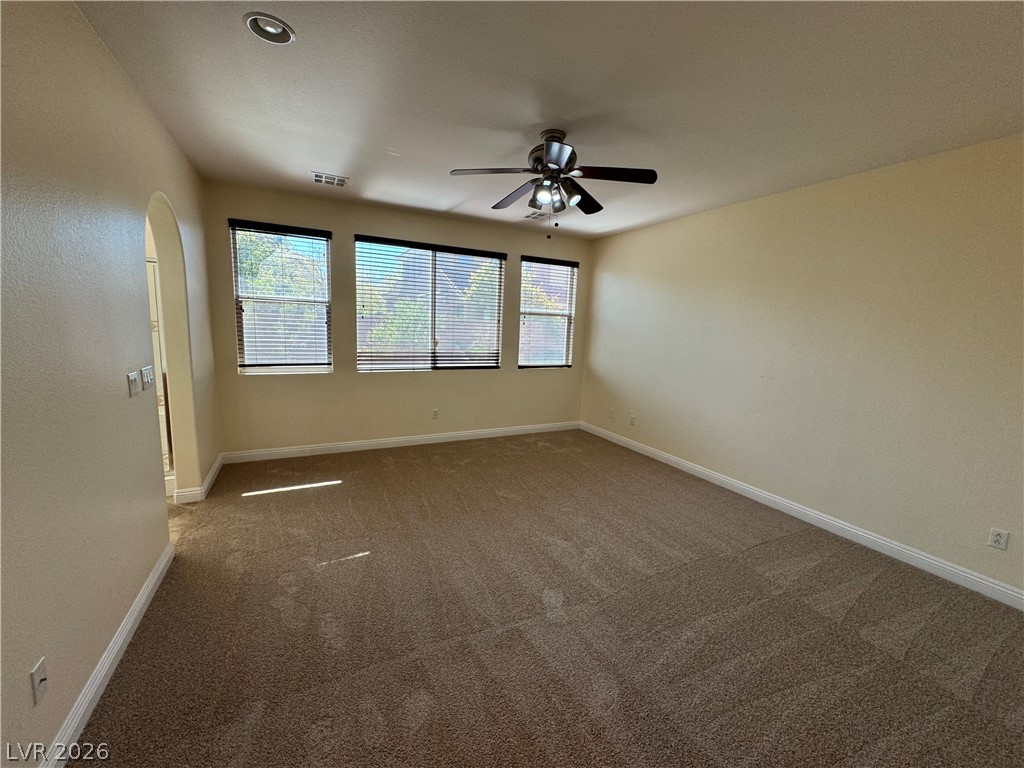 1333 Jamesbury Road Las Vegas, NV 89135 - Photo 30 of 43 A spacious room offers comfortable carpeting and multiple windows.