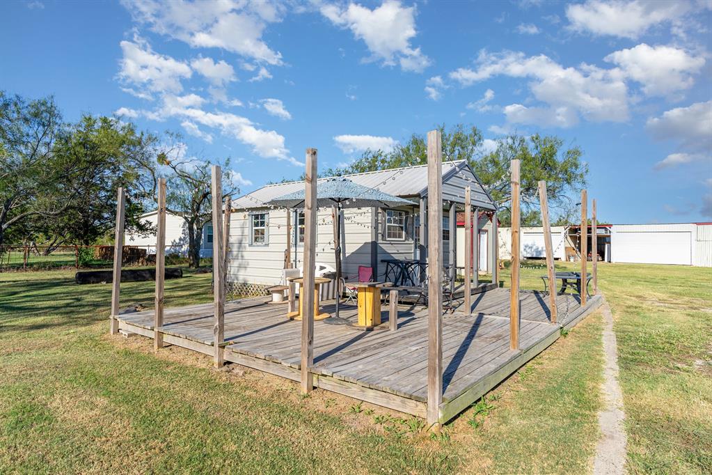 6524 Fair Road Kaufman, TX 75142 - Photo 21 of 33 a view of a house with swimming pool and sitting area