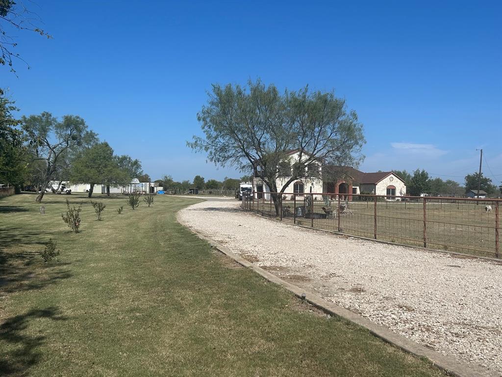 6524 Fair Road Kaufman, TX 75142 - Photo 29 of 33 a view of road with large tree
