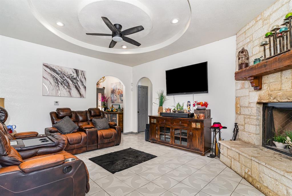 6524 Fair Road Kaufman, TX 75142 - Photo 5 of 33 a living room with furniture and a flat screen tv