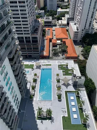 an aerial view of houses with outdoor space