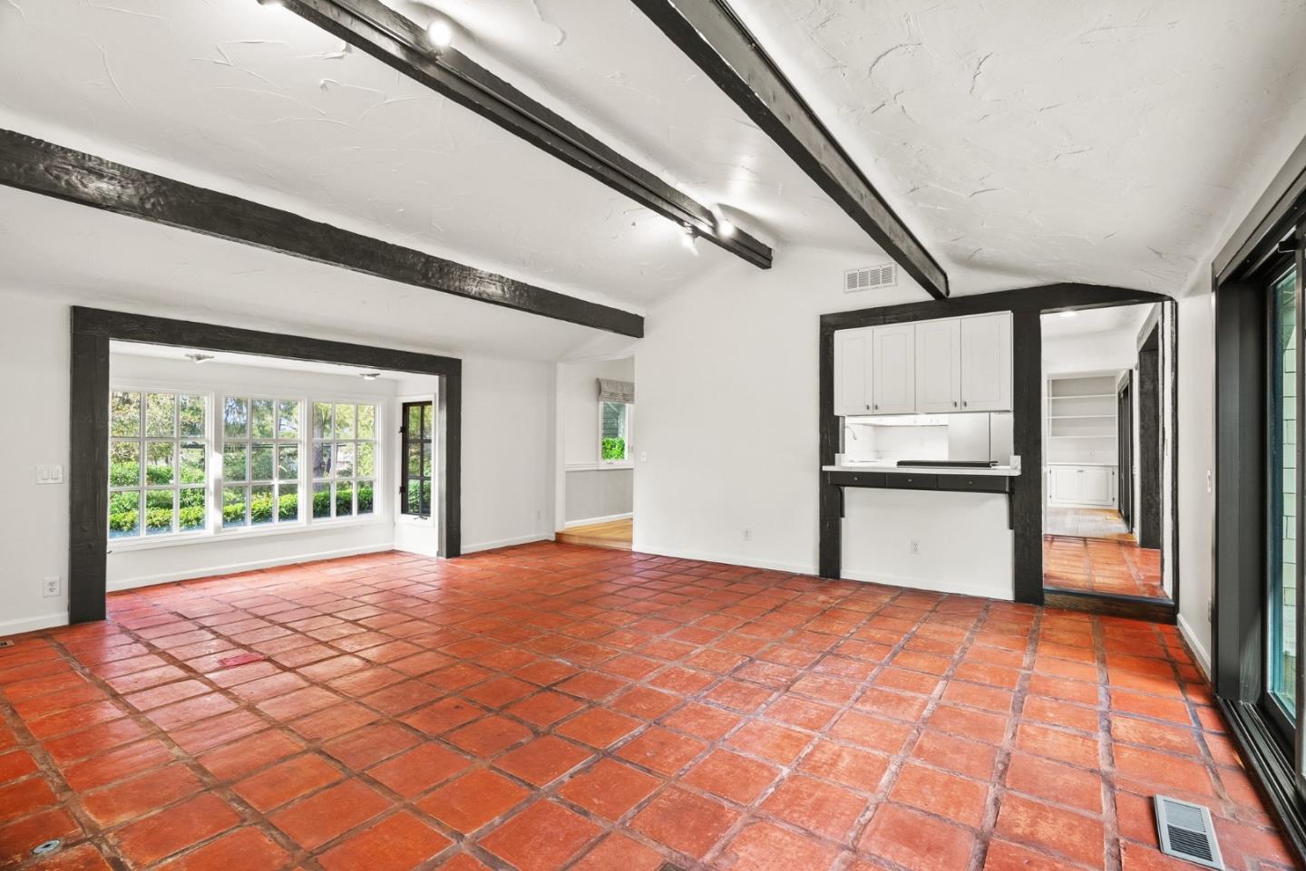 3041 Bird Rock Road Pebble Beach, CA 93953 - Photo 13 of 35 a view of empty room with wooden floor and fan