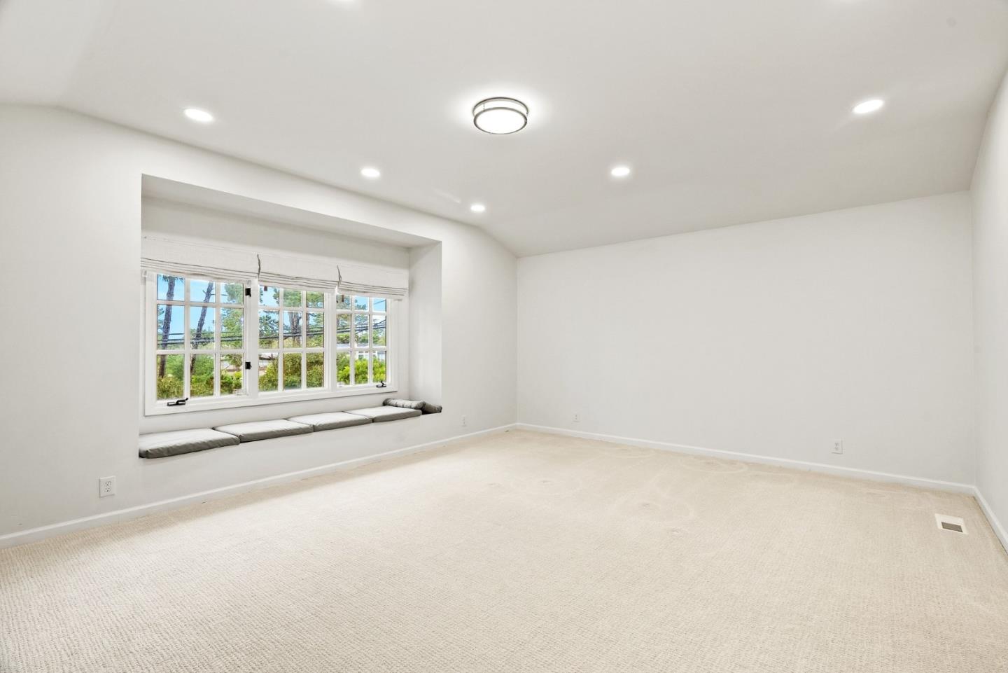 3041 Bird Rock Road Pebble Beach, CA 93953 - Photo 18 of 35 an empty room with a window